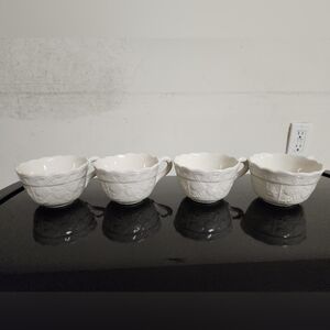 Set of Four White Embossed Teacups